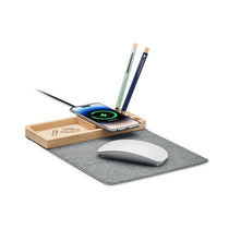 Wooden tray with smartphone, mouse, and pens on a gray mat